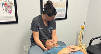 Shelby Tate adjusting a patient